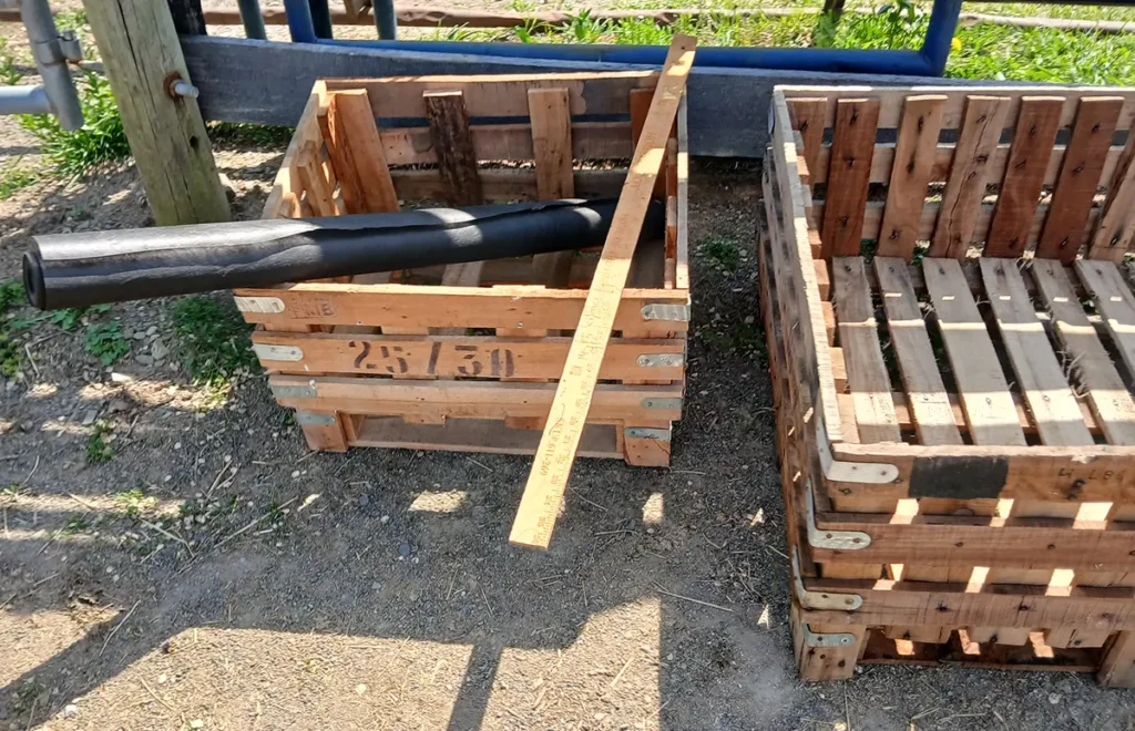 Wooden crates and materials used to build a horse herb garden planter